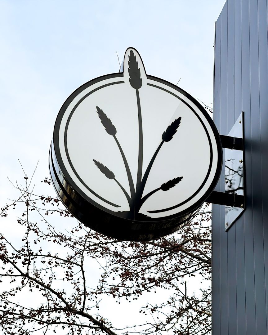 dunegrass lit exterior custom blade sign