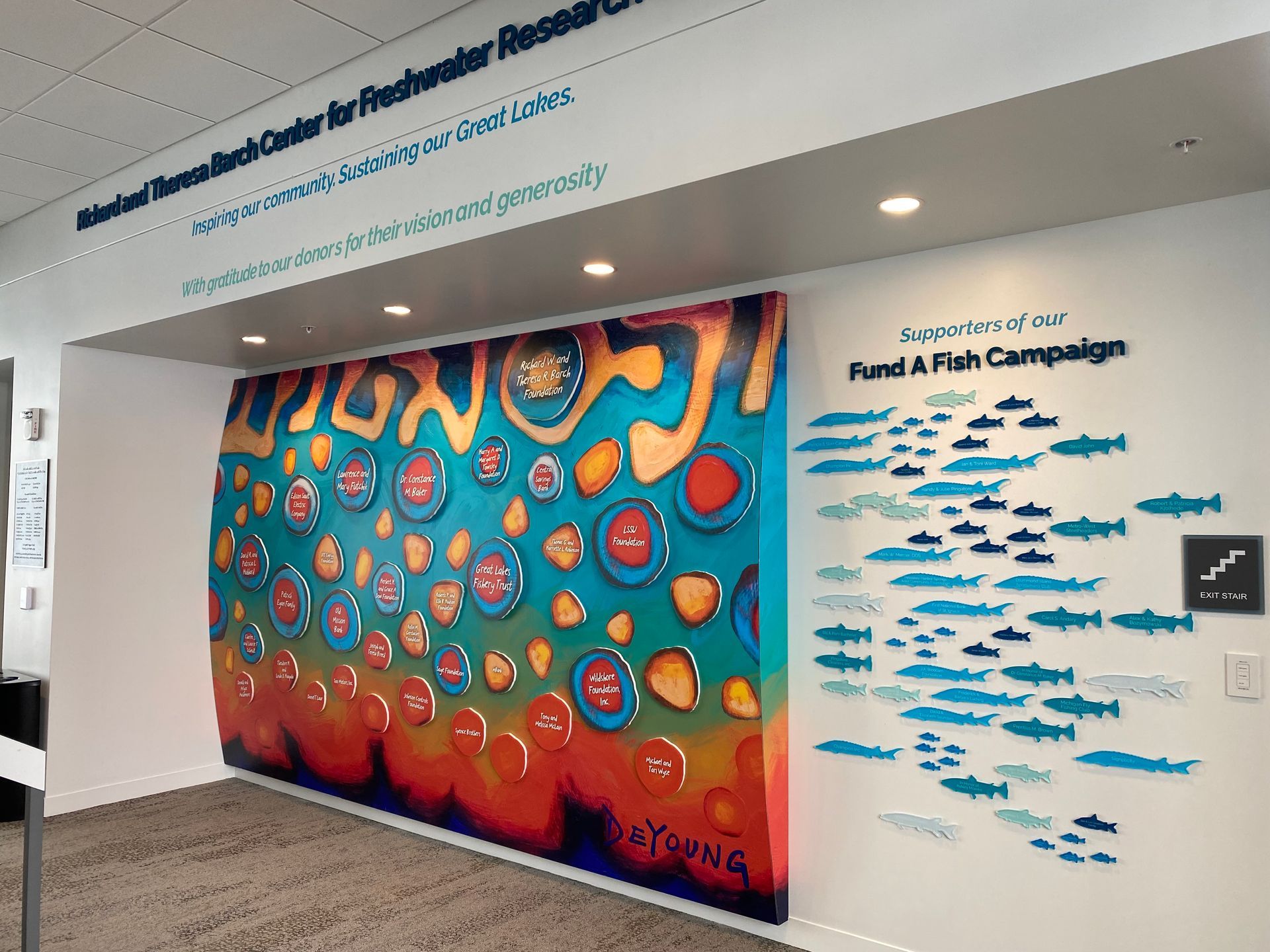 fund a fish donor wall custom interior graphics signage