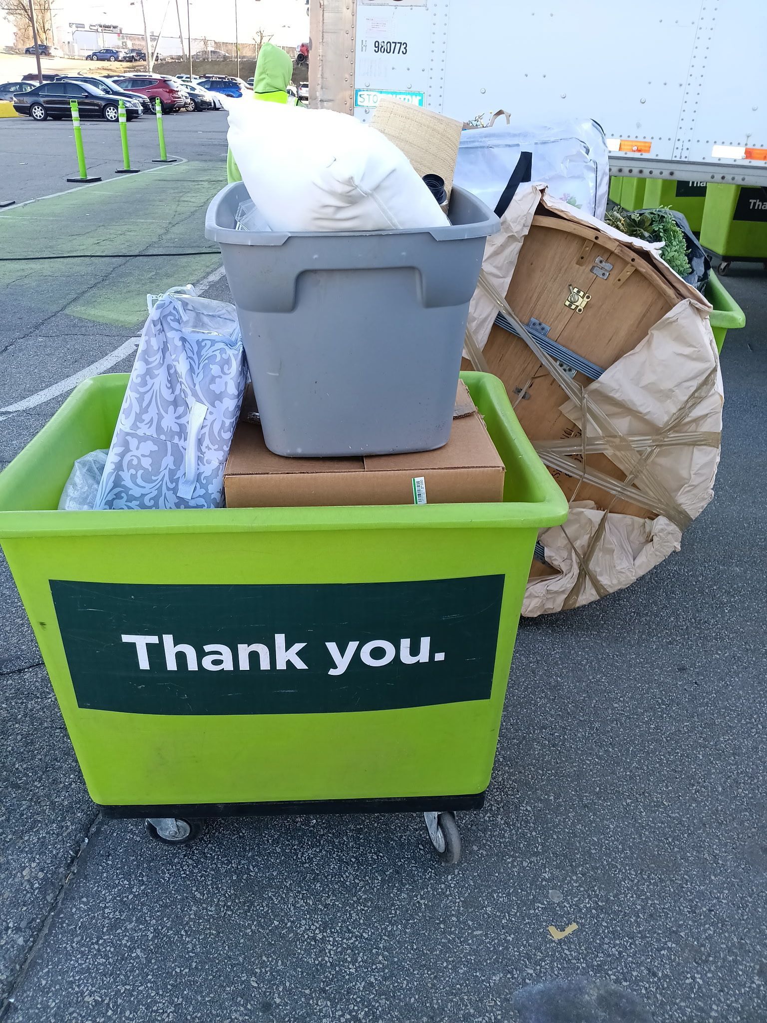 A green bin with the words thank you on it