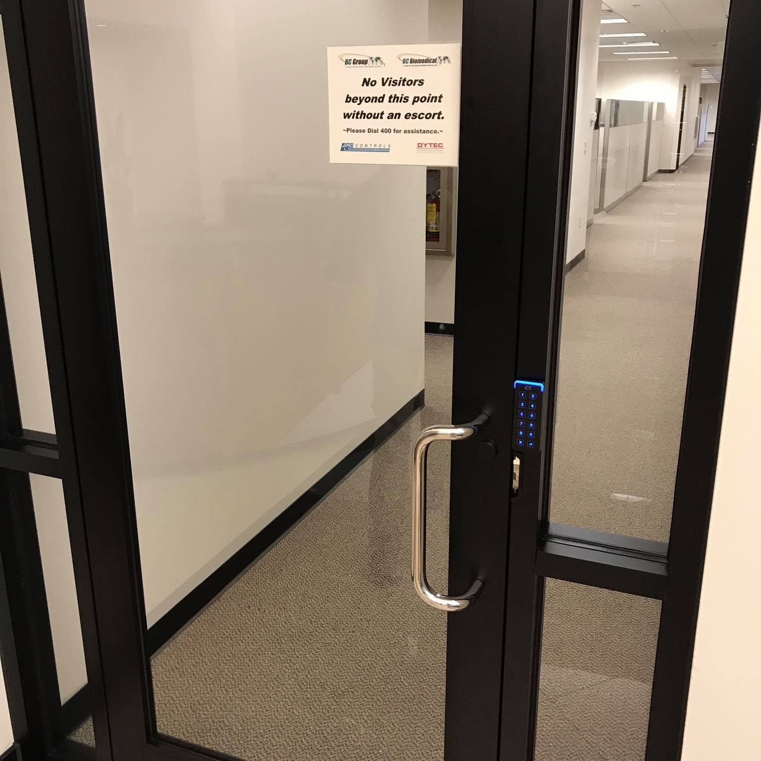 A door with a sign on it that says no visitors