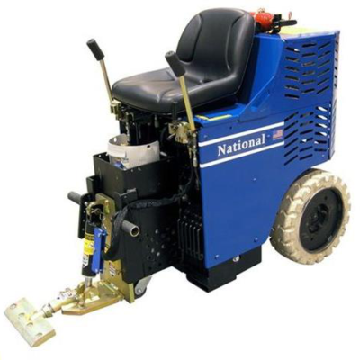 Blue and black National floor scraper machine with seat and controls.
