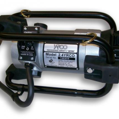 A silver and black VRCO Model 2.4YRCO pump with a black handle and a caution label.