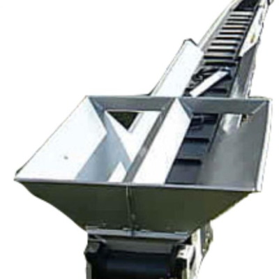 A silver conveyor belt with a large hopper is used for moving materials.