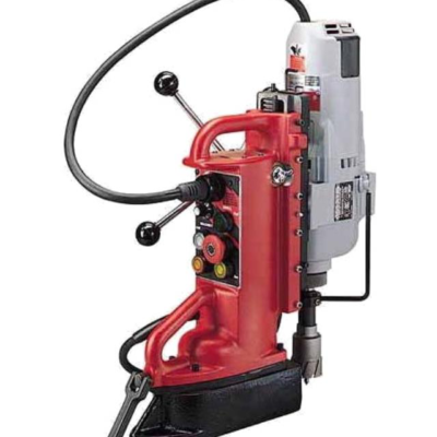 Red and silver magnetic drill press on a white background.