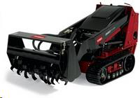 Red and black tracked skid steer with a soil-cultivating attachment.