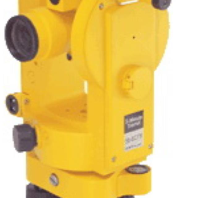 Yellow surveying theodolite, used for measuring angles.