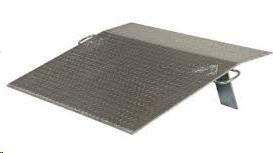 Metal wheelchair ramp with textured surface and support leg.