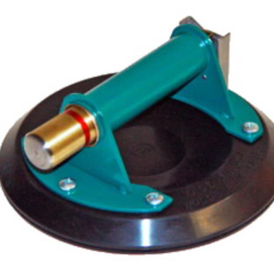 Green and black suction cup tool with a handle, used for lifting.