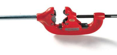 Red pipe cutter clamped onto a metal pipe, ready to cut.
