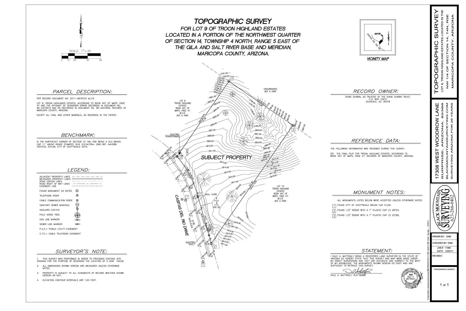 A black and white drawing of a topographic survey of a property.