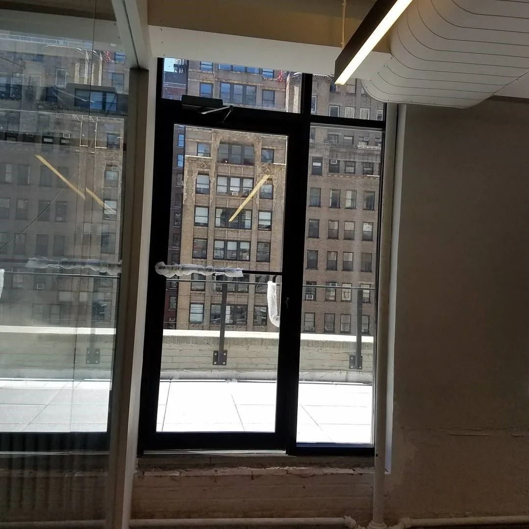 A large window with a view of a city