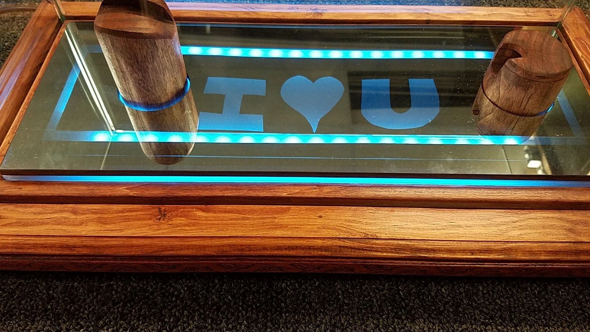 A glass display case with the words i love you written on it