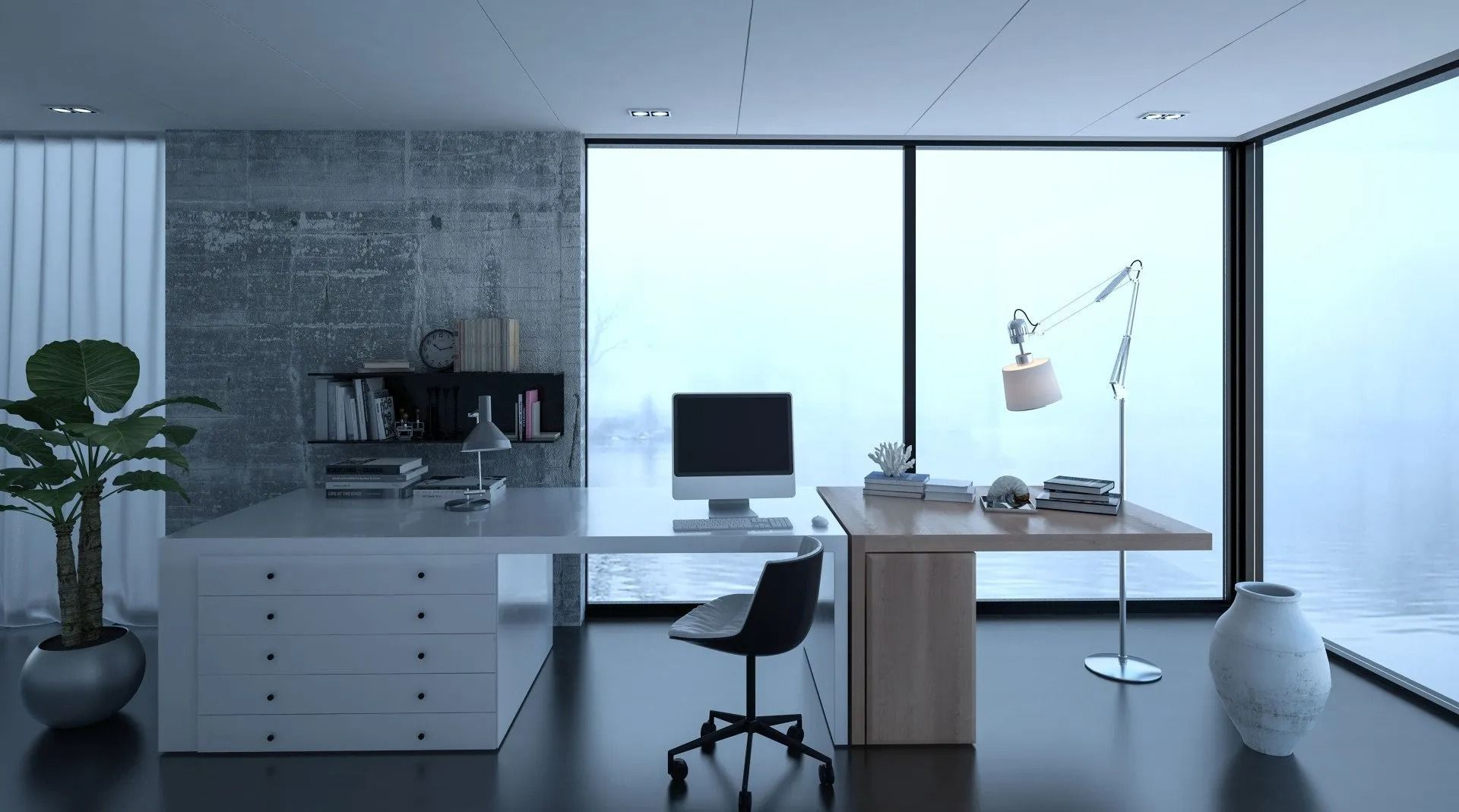 There is a computer on the desk in the office.