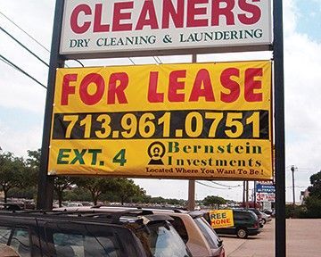 A sign for cleaners dry cleaning and laundering