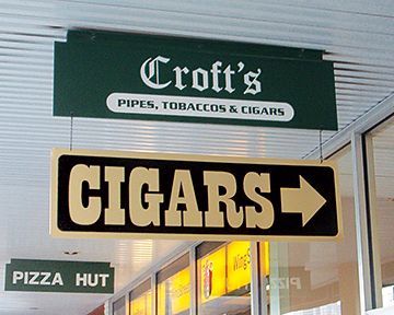 A sign for croft 's pipes tobaccos and cigars