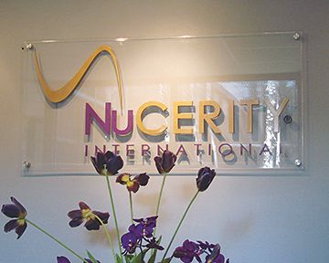 A clear sign that says nucerity international on it