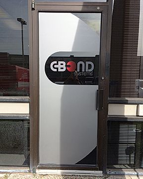 A door with a sticker on it that says gbond systems.