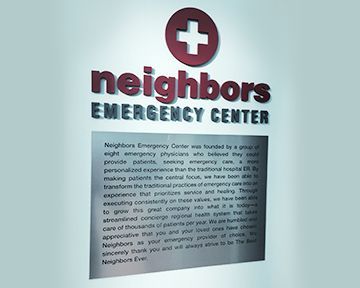 A sign that says neighbors emergency center on it