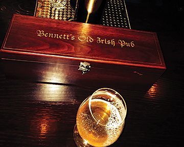 A wooden box with the name bennett 's old irish pub on it