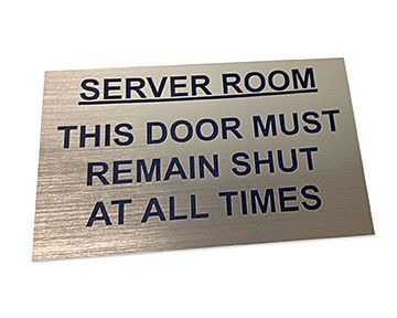 A sign that says server room this door must remain shut at all times