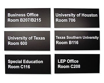 A set of black signs that say business office room b207 / b215