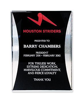 A plaque that says houston striders presented to barry chambers