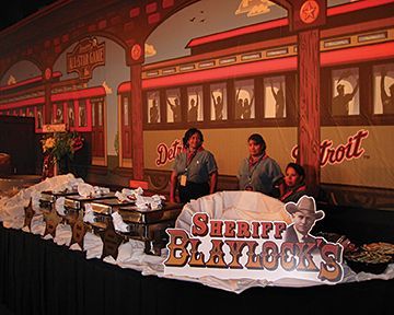 A buffet table with a sign that says sheriff blaylocks
