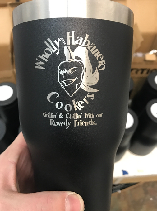 A black tumbler with a logo on it.