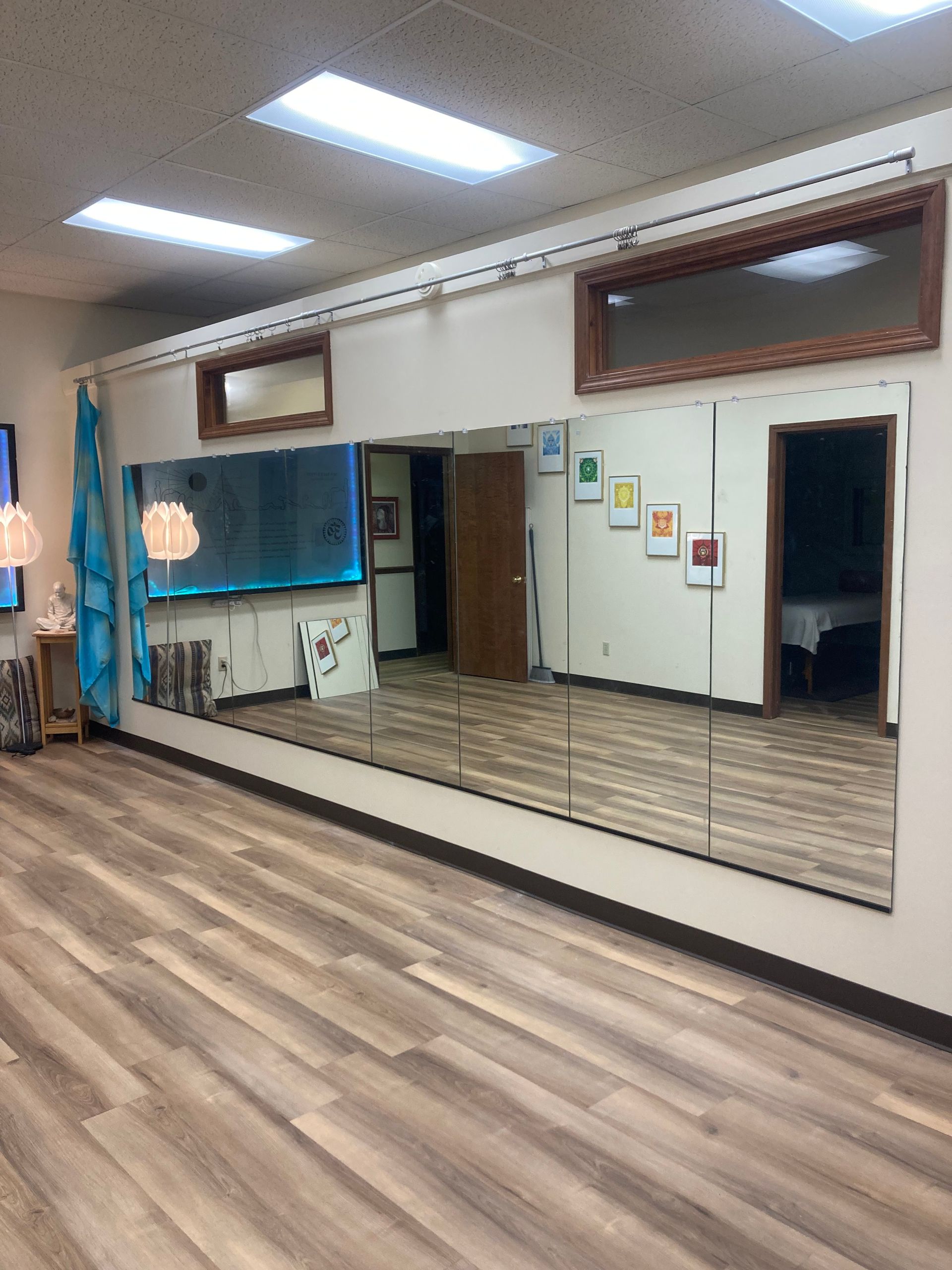 There is a large mirror in the middle of the room.