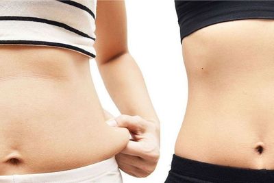 Side-by-side close-up of a waist before and after weight loss, showing pinched belly fat and a slimmer stomach