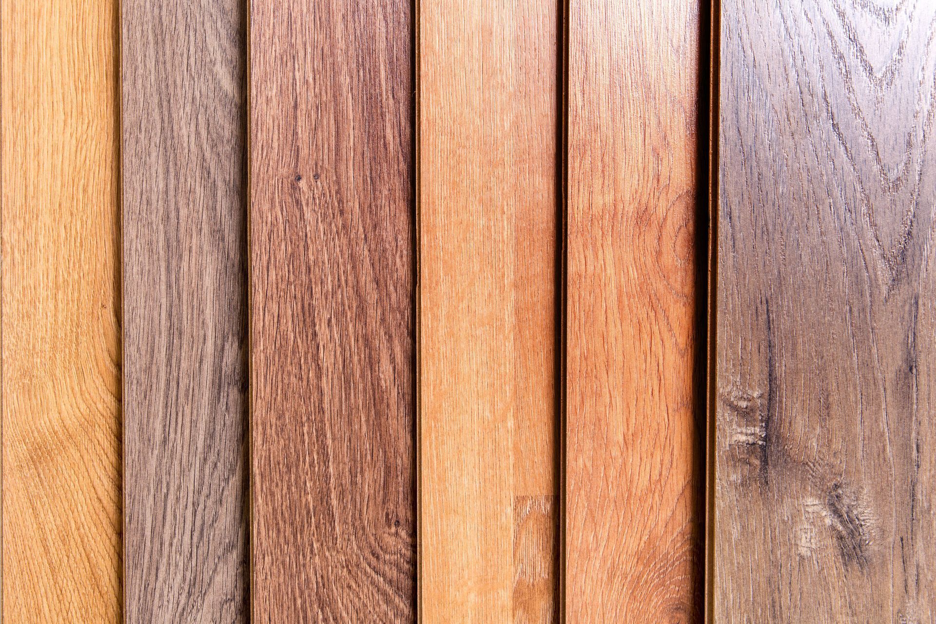 Close-up of vertical wooden planks with varied brown tones and grain patterns