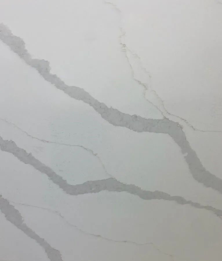Light gray marble surface with soft white and gray veining.