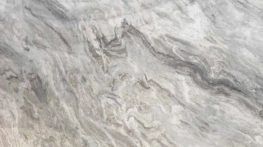 Gray and white marbled stone surface with subtle swirling patterns
