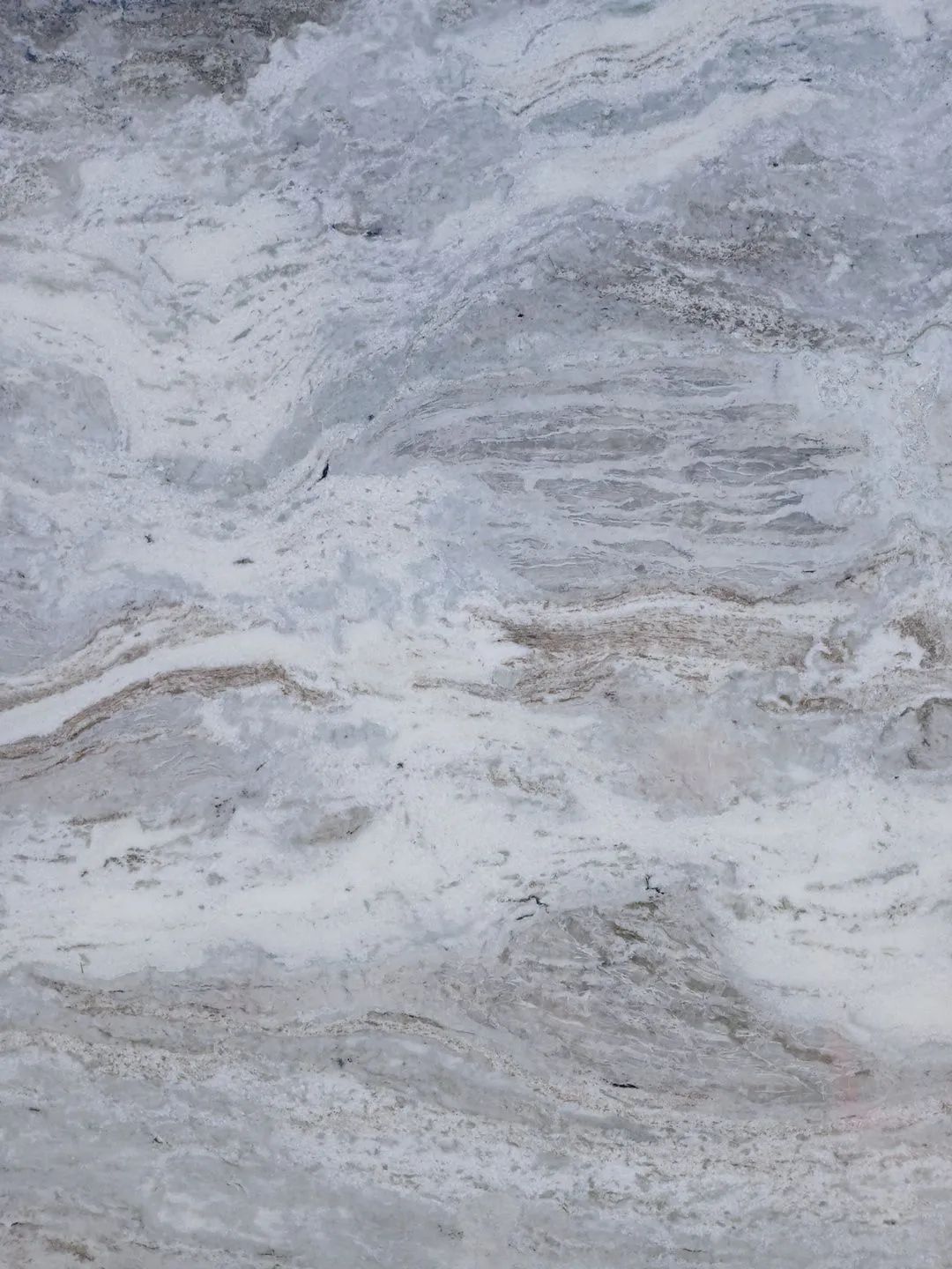Light gray and white marbled stone surface with subtle veining and texture