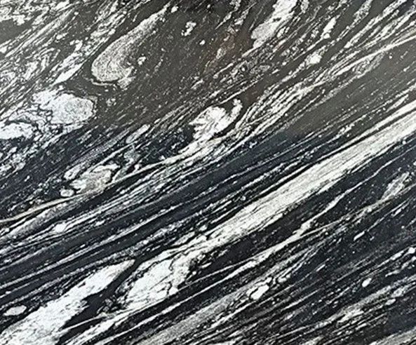 Black and white marble-like stone texture with swirling veins
