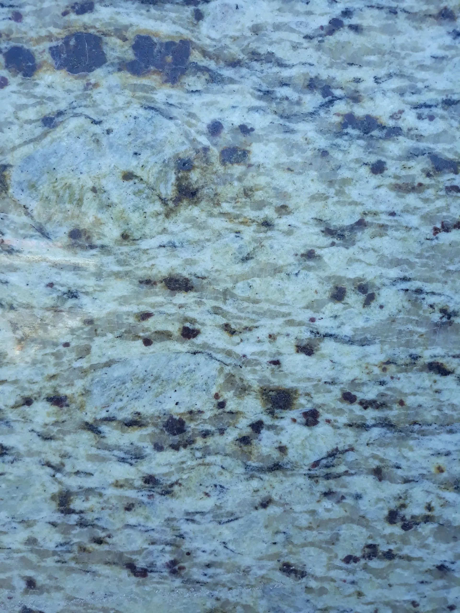 Blue-gray speckled stone or granite surface