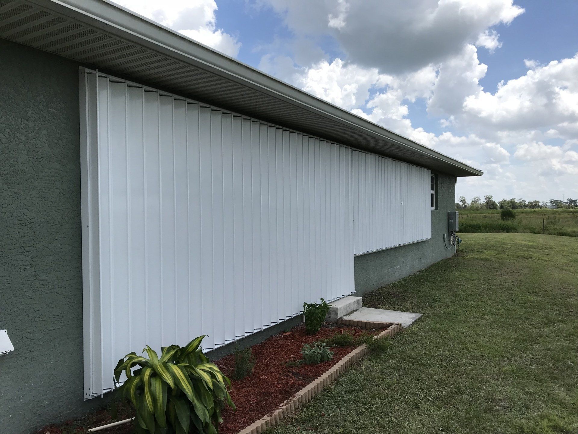 Bertha accordion shutters