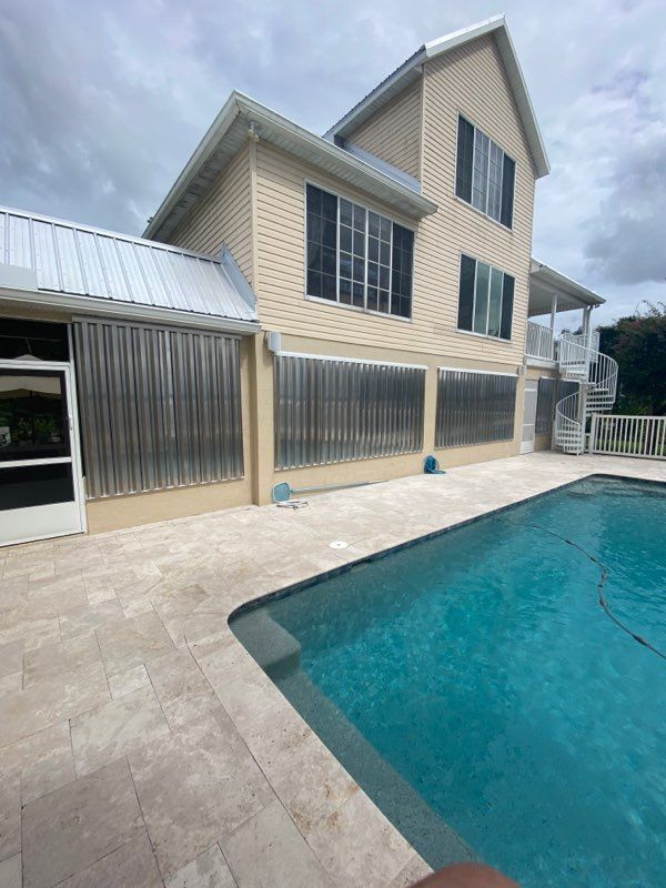 Corrugated storm panels