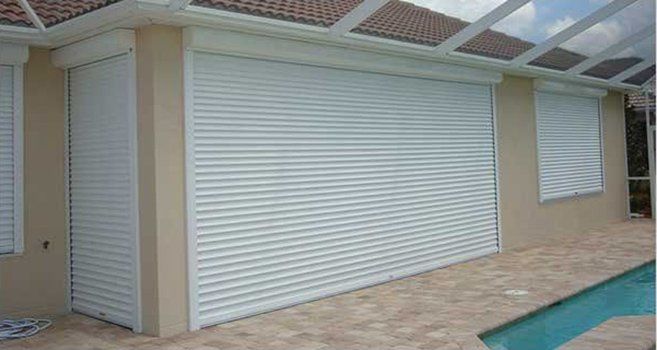 Garage hurricane shutters