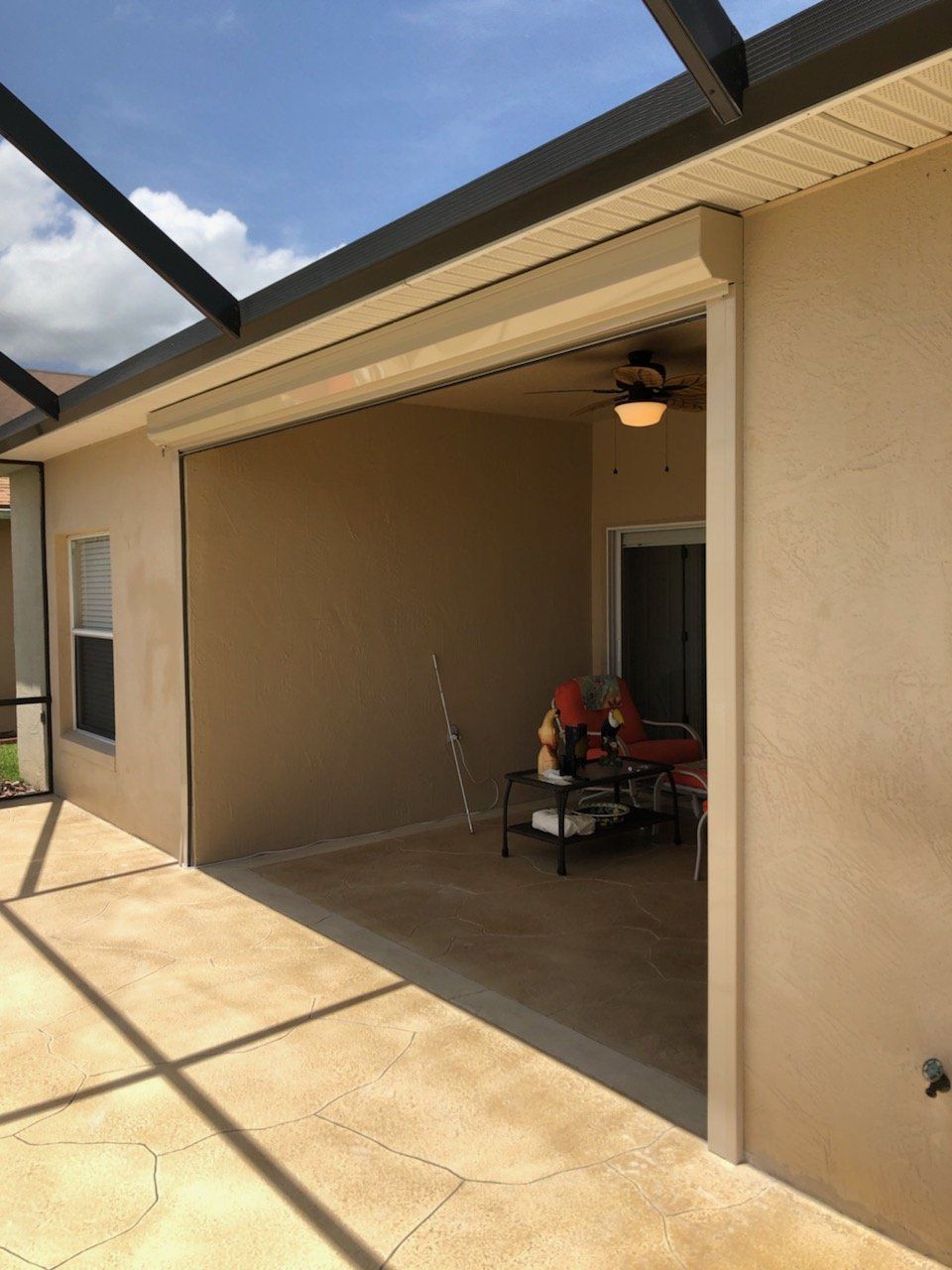 Garage hurricane shutters