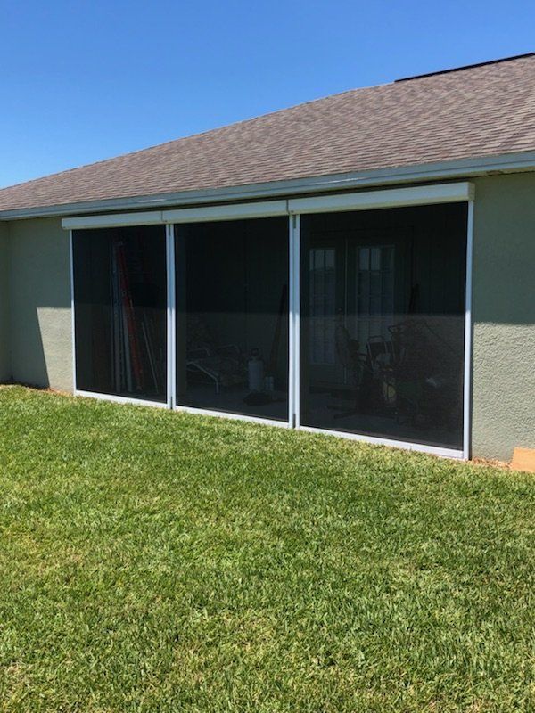 Motorized garage screen