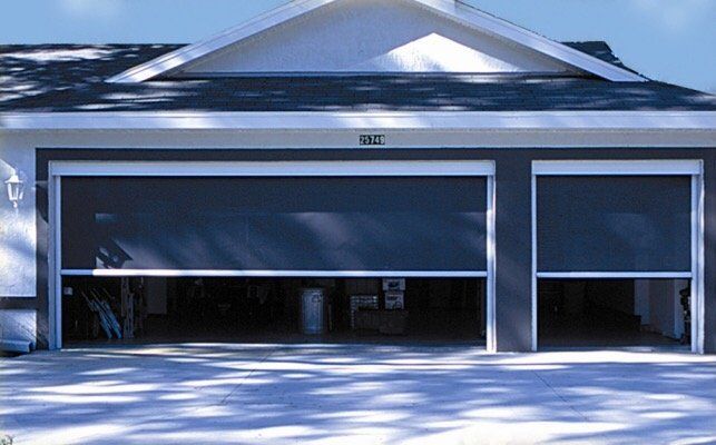 Motorized garage screen