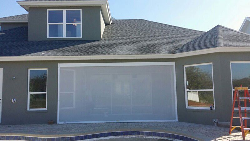 Big motorized garage screen