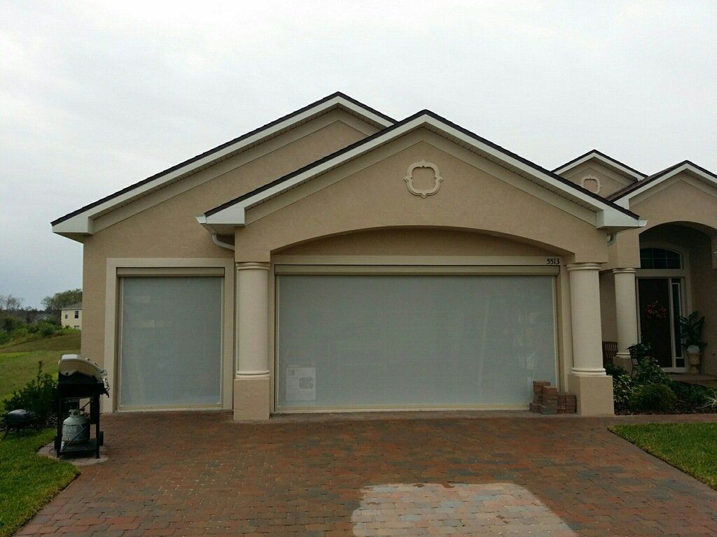Motorized garage screen