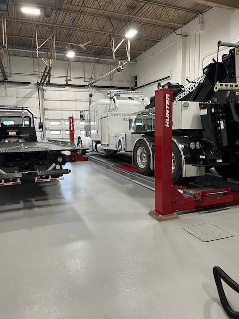 Trucks being worked on in a shop