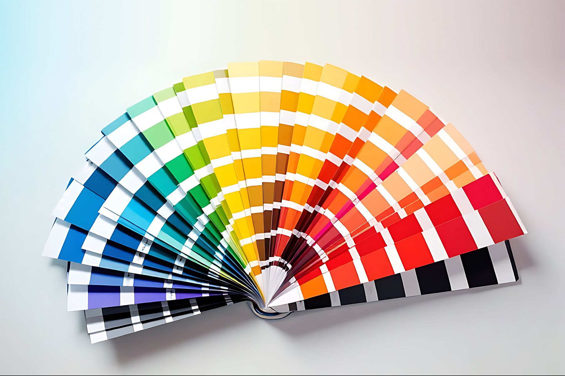 Color palette fan with a vibrant spectrum of hues arranged in a gradient.