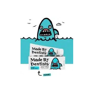 A tube of made by dentists toothpaste with a shark on it.