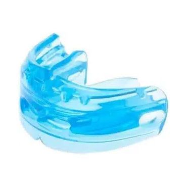 A blue mouth guard is sitting on a white surface.