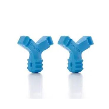 A pair of blue y shaped chew toys for dogs on a white surface.