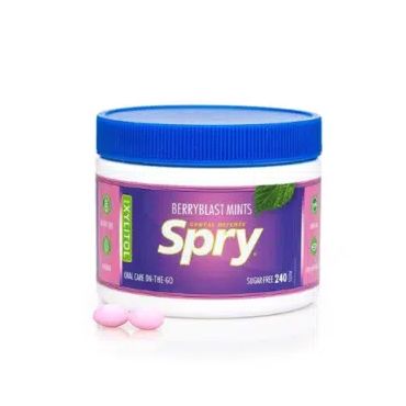 A jar of spry berry blast mints on a white background.